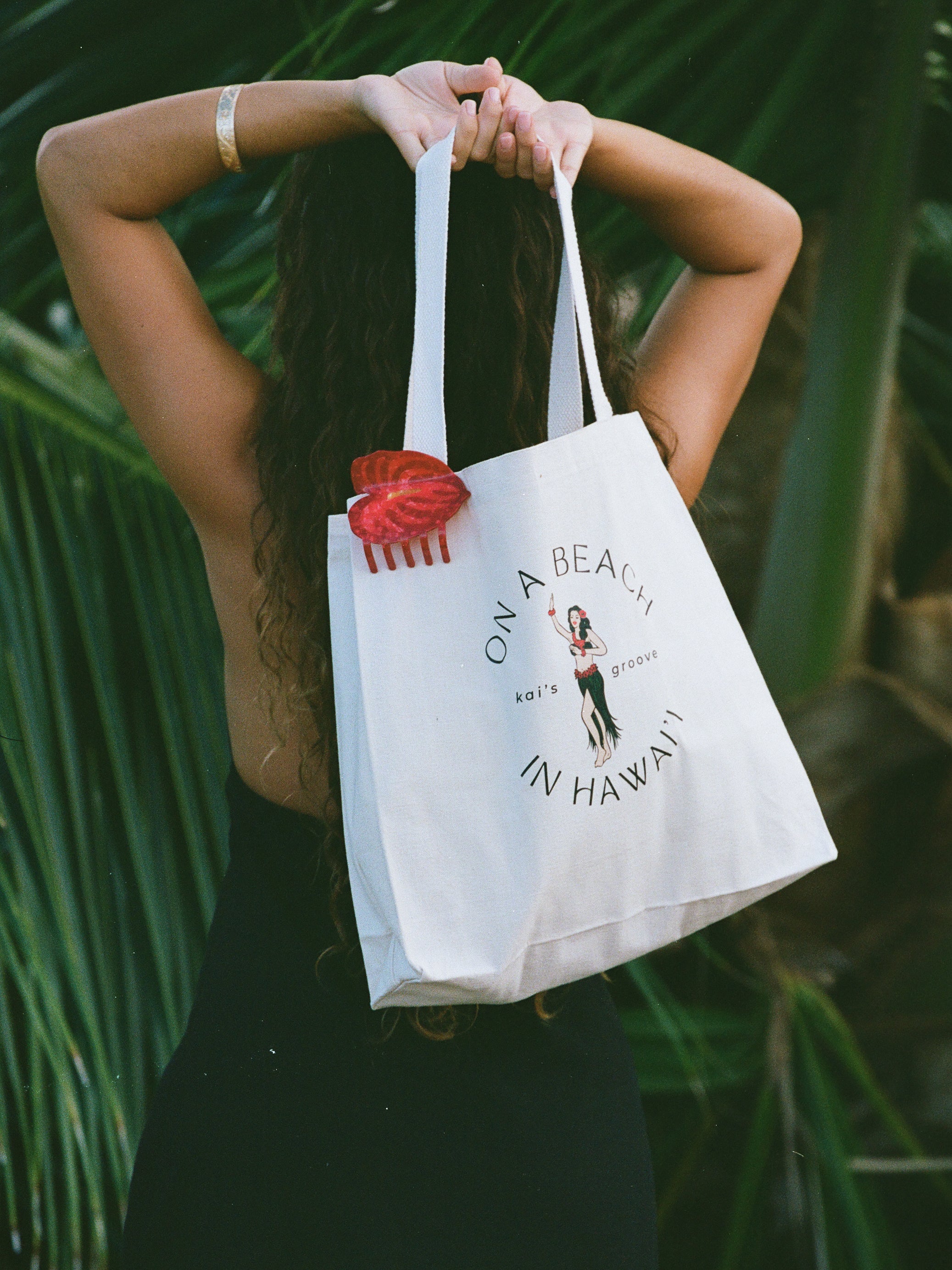 on a beach in hawai'i - canvas tote bag