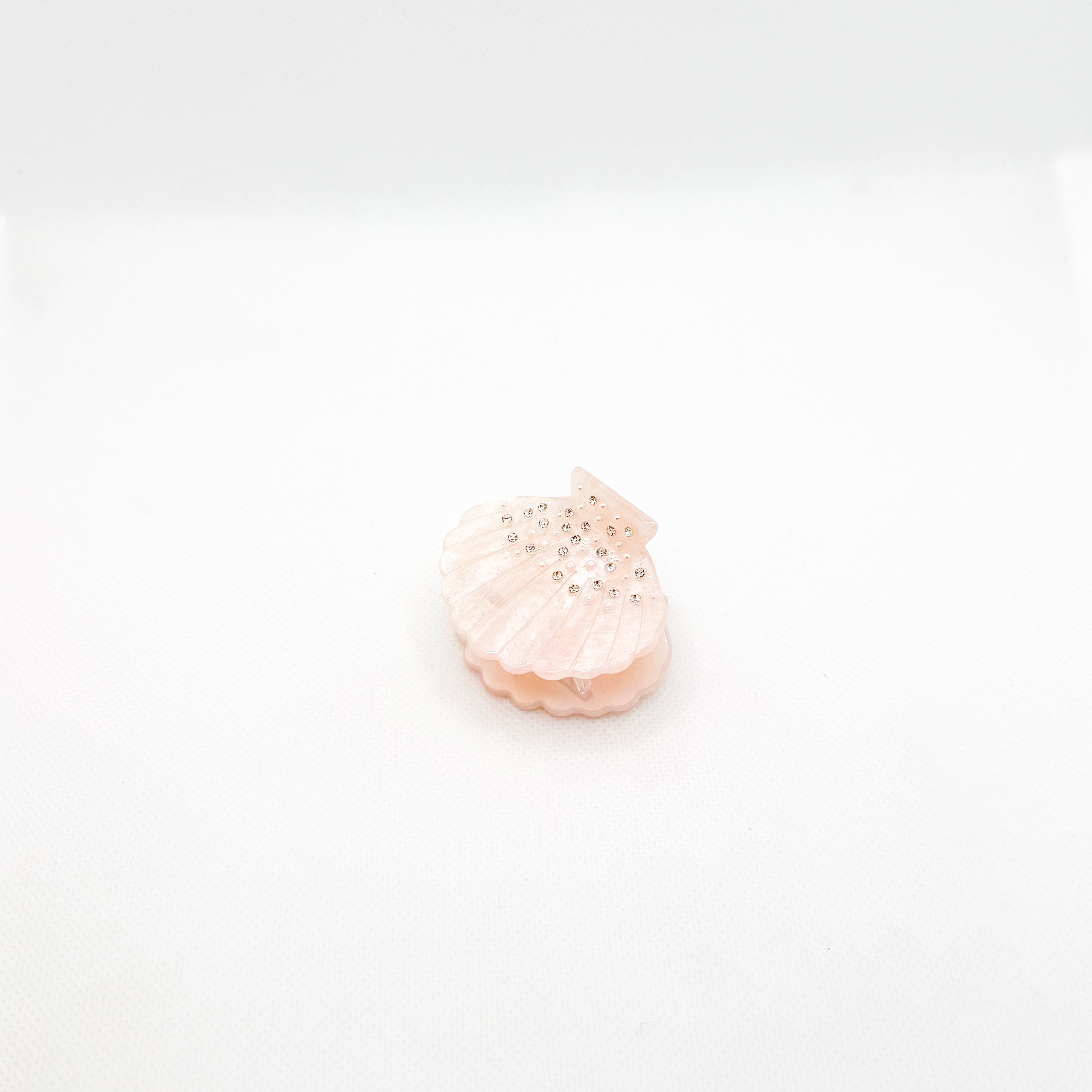 midi baby pink sparkly shell hair clip