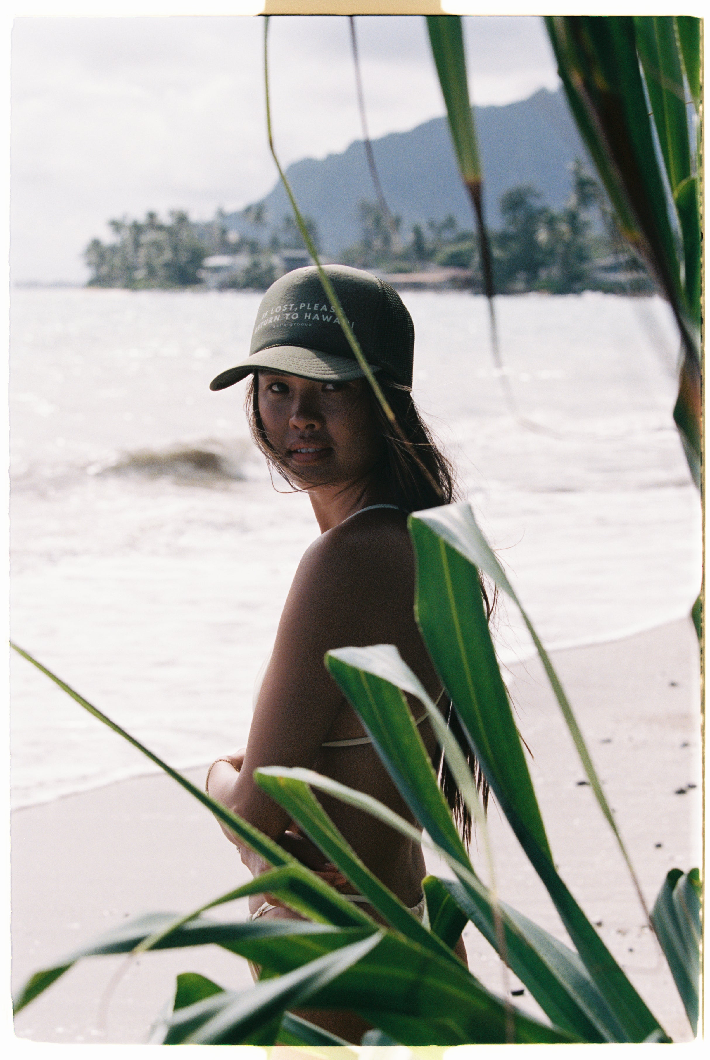 IF LOST, PLEASE RETURN TO HAWAI’I green trucker hat