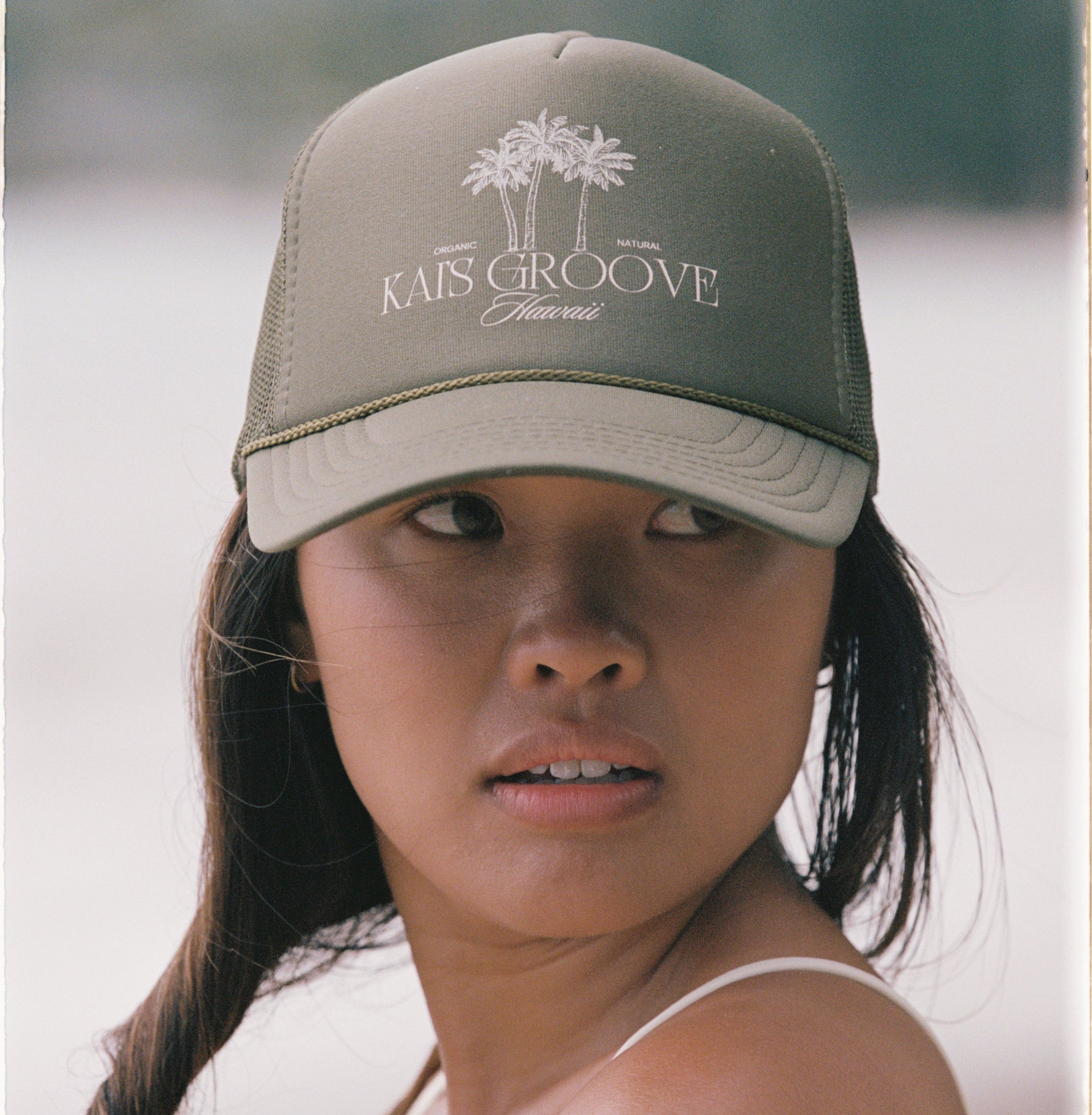 KAI’S GROOVE green trucker hat