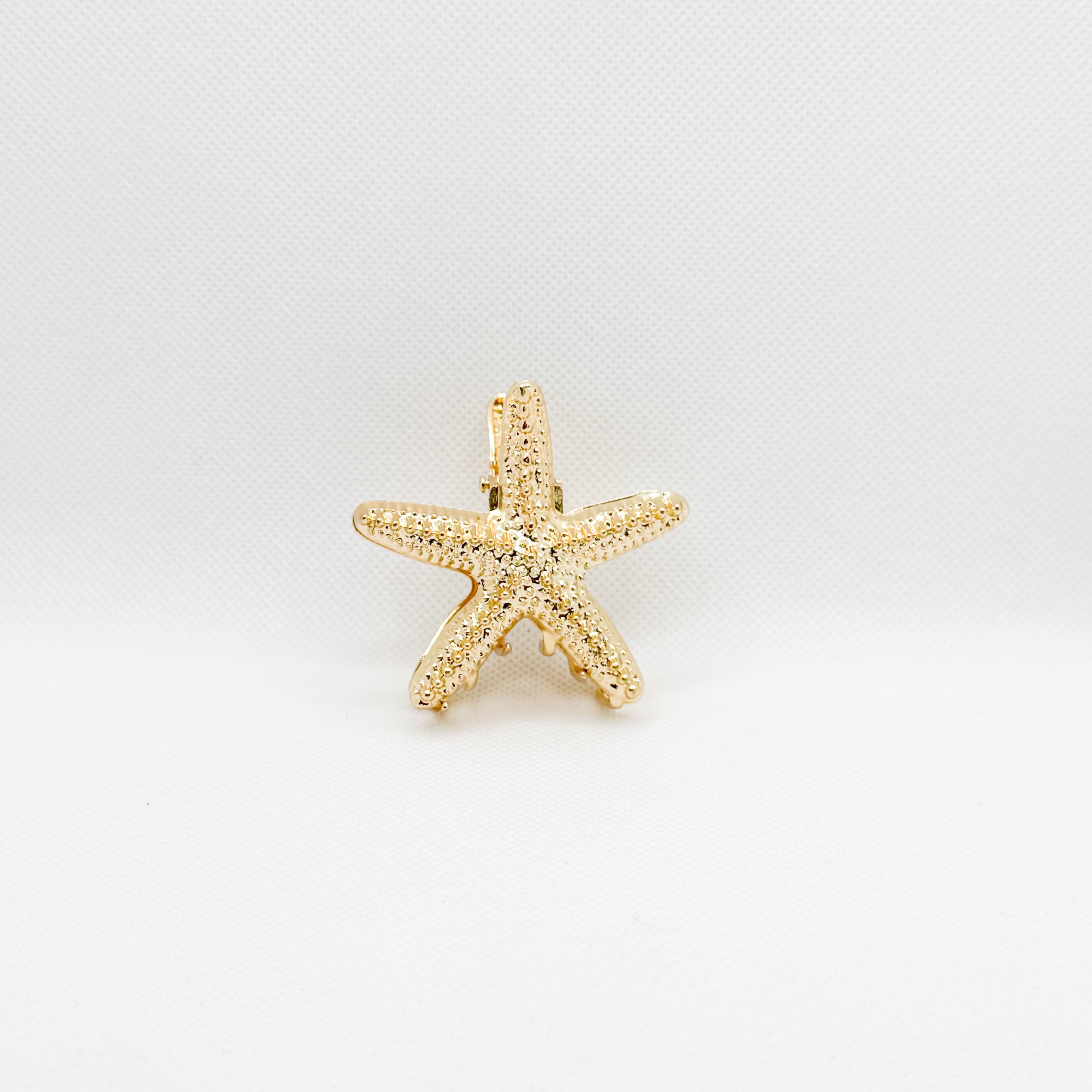 midi golden starfish hair clip