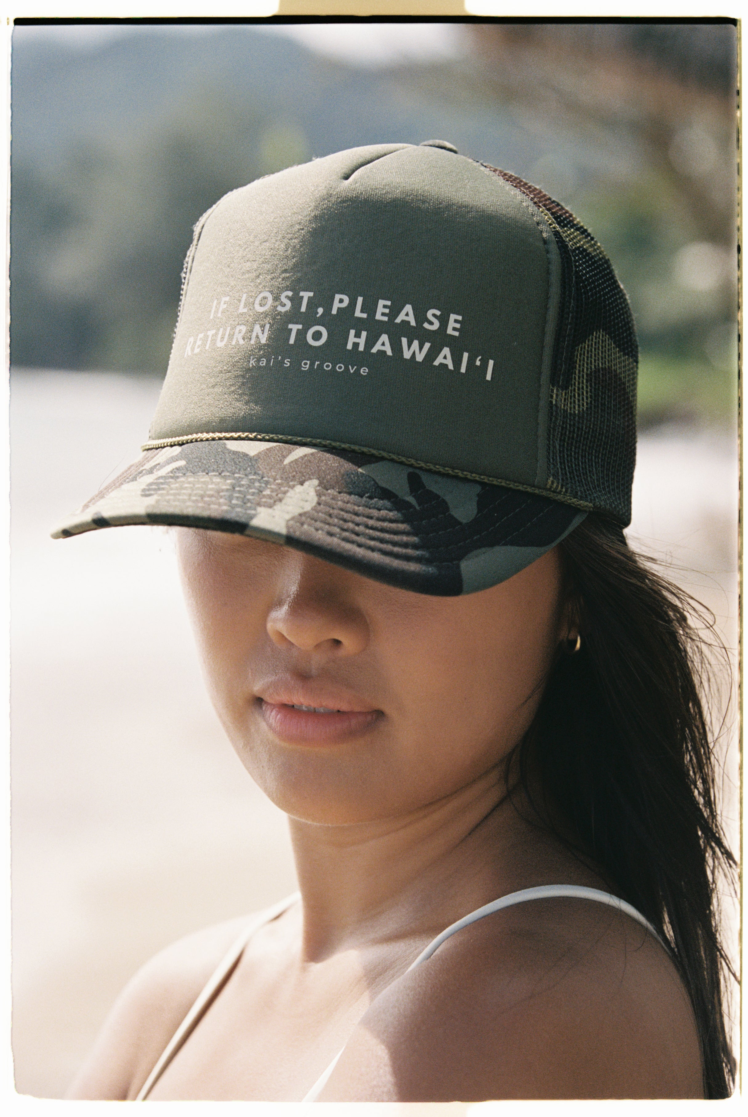 IF LOST, PLEASE RETURN TO HAWAI’I green/camo trucker hat
