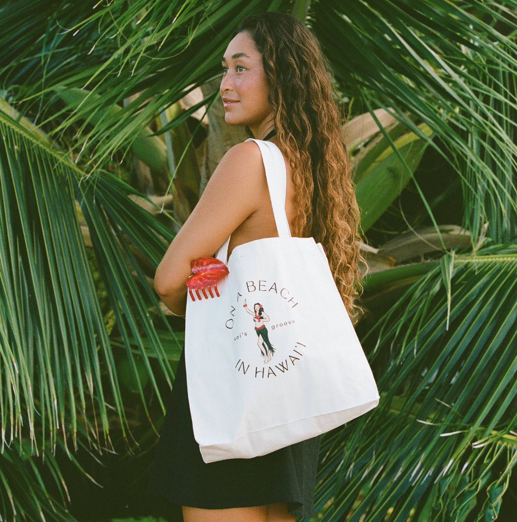 on a beach in hawai'i - canvas tote bag