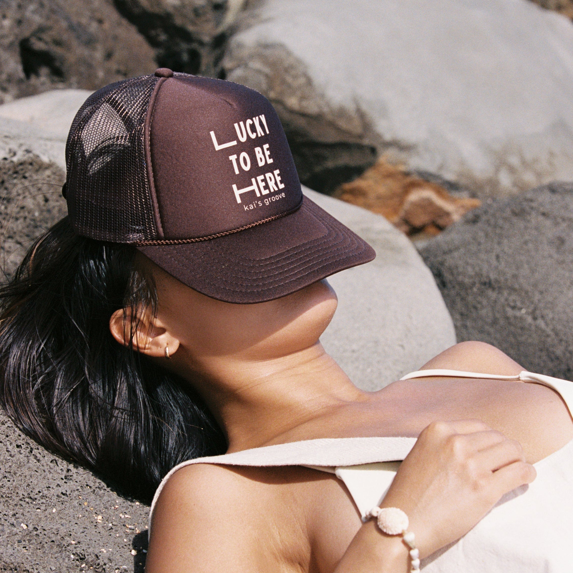 LUCKY TO BE HERE brown trucker hat