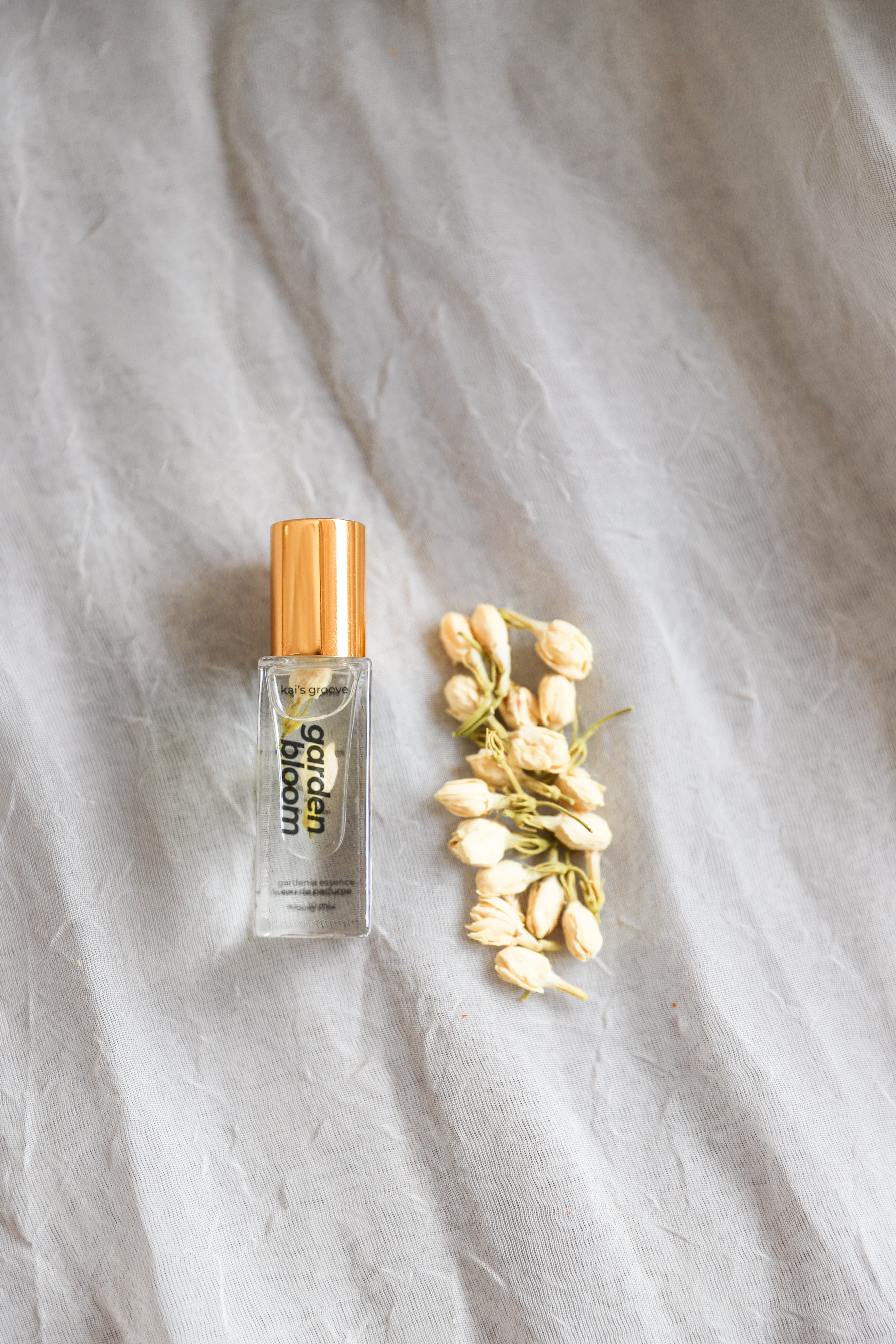Organic Natural Gardenia Vanilla Jasmine floral Essential oil roller All-natural fragrance Fragrance for sensitive skin Romantic scent Feminine scent Everyday wear Convenient and easy to use Portable God/goddess scent Non-toxic Clean beauty Sustainable Roll-on perfume Aromatherapy Stress relief Calming Relaxation Natural alternative to traditional perfumes Stress relief Calming Relaxation Organic ingredients Aromatherapy Portable fragrance Essential oil blend On-the-go fragrance Giftable