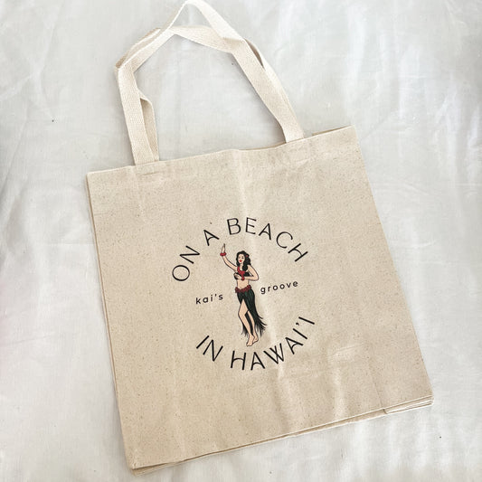 on a beach in hawai’i tote bag