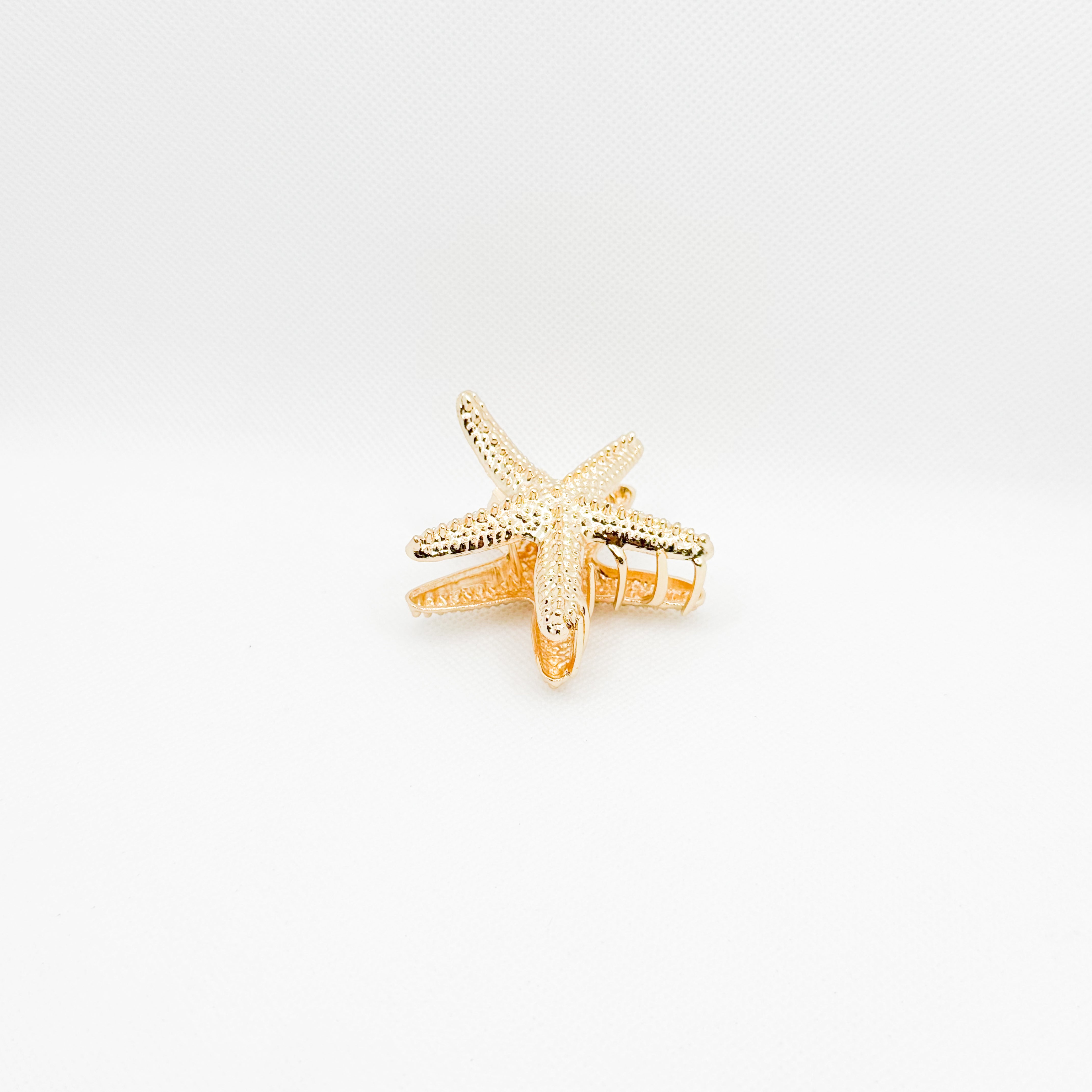 golden starfish medium hair clip