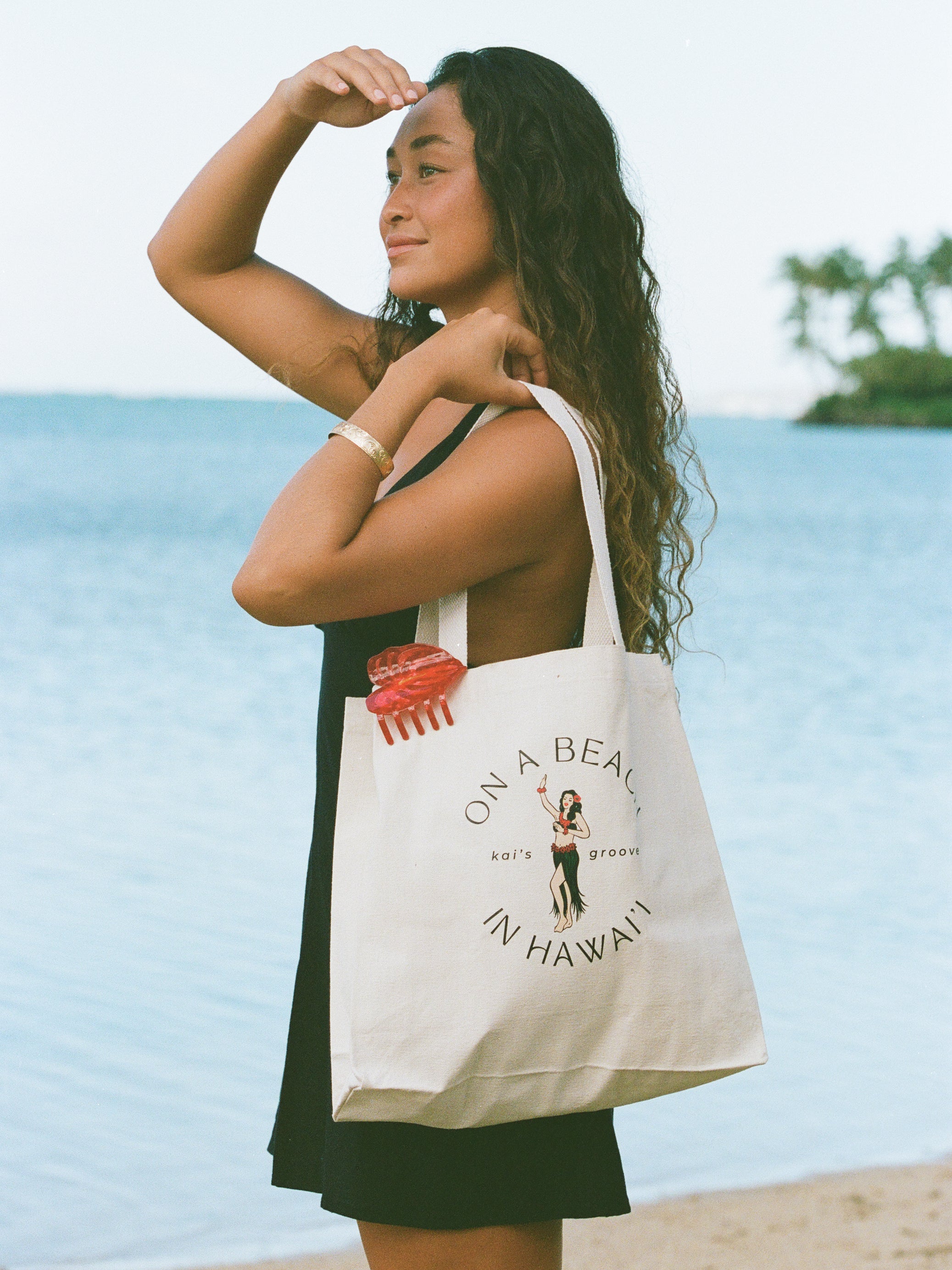 on a beach in hawai'i - canvas tote bag